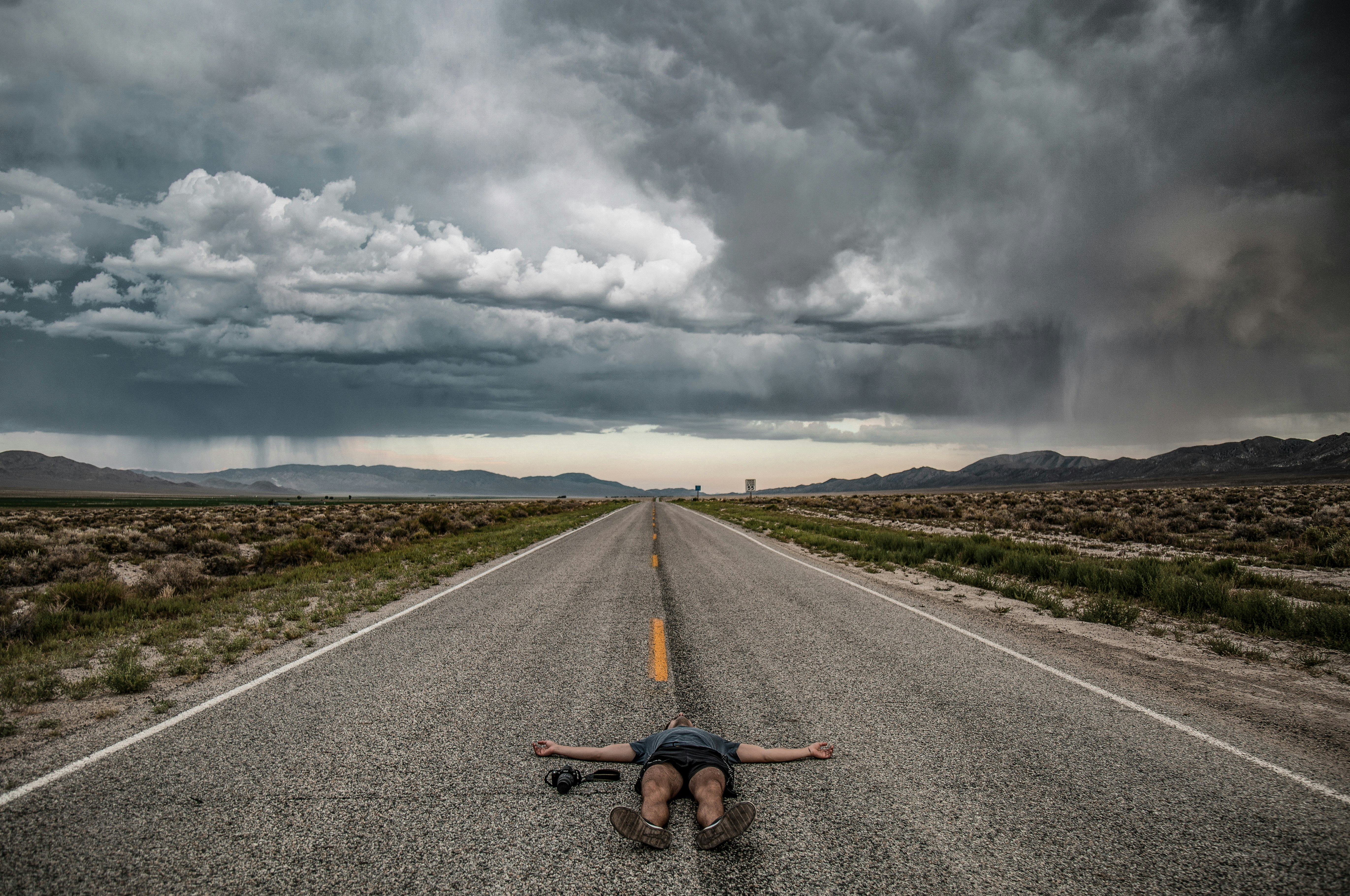 photography person lying on road